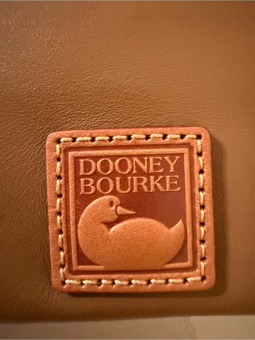 Dooney & Bourke double-zip leather pouch/wristlet EUC